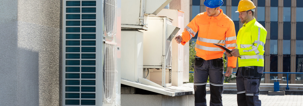 Commercial HVAC workers doing Preventative Maintenance